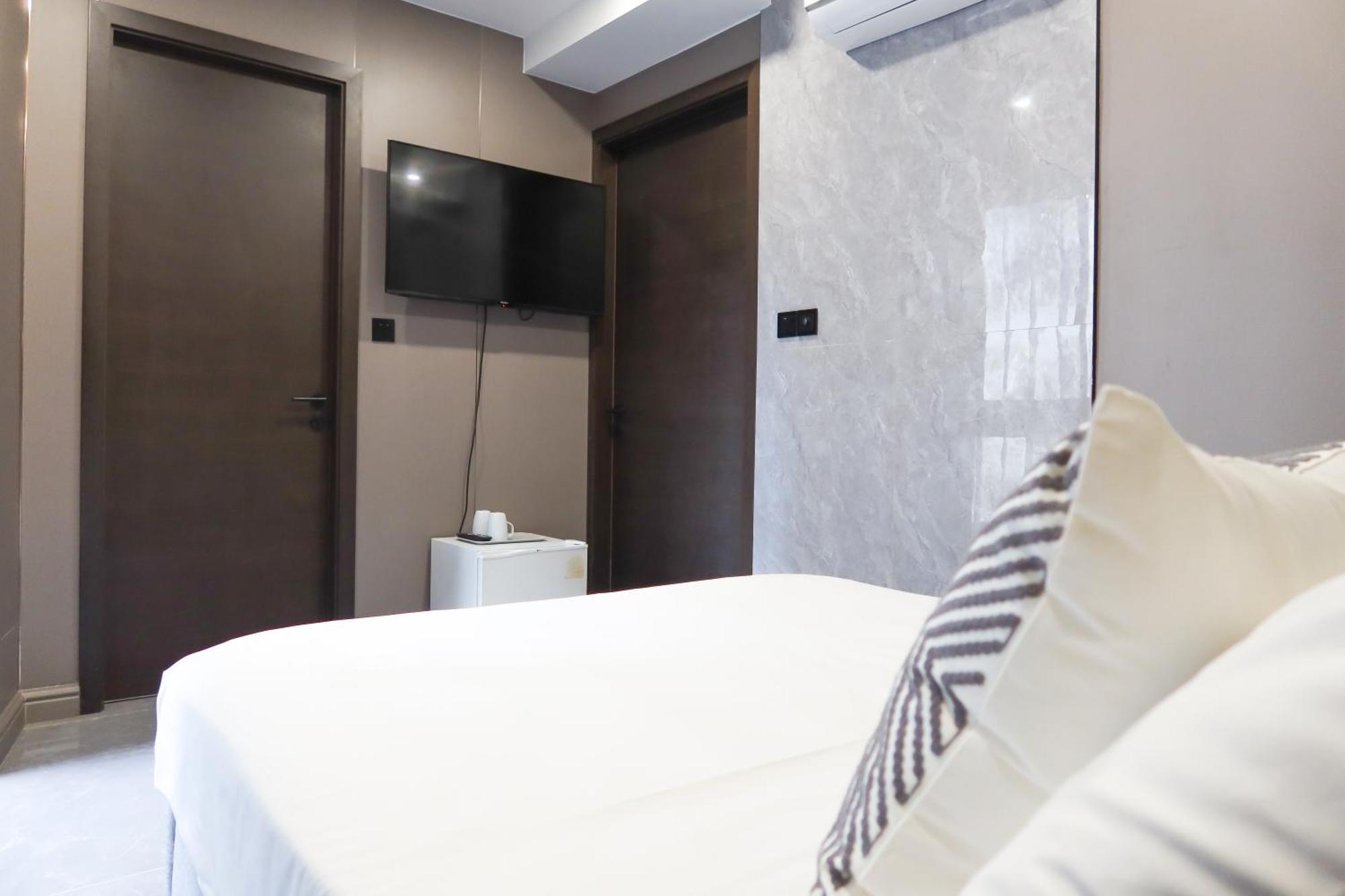 Recharge Studio Apartment & Suites Σιγκαπούρη Δωμάτιο φωτογραφία