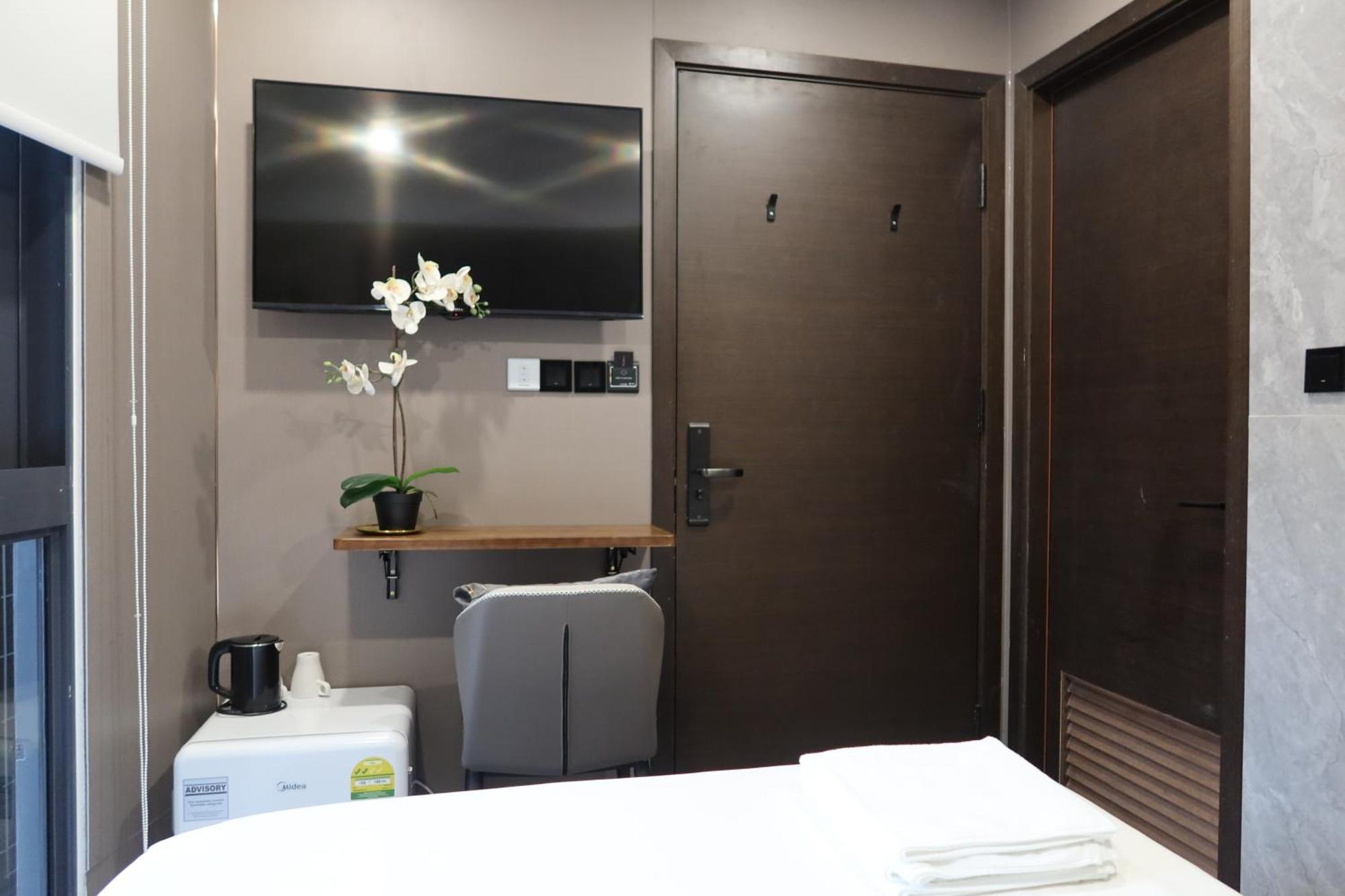 Recharge Studio Apartment & Suites Σιγκαπούρη Δωμάτιο φωτογραφία