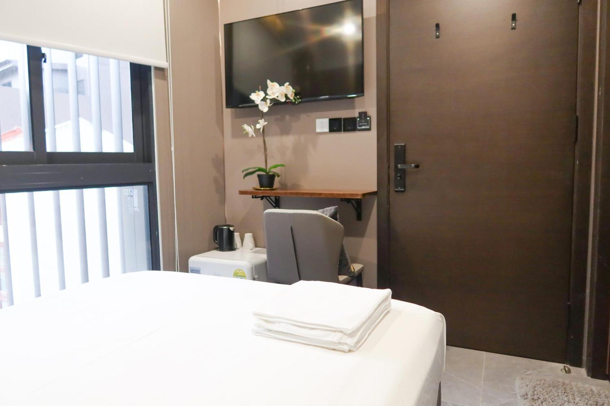Recharge Studio Apartment & Suites Σιγκαπούρη Δωμάτιο φωτογραφία